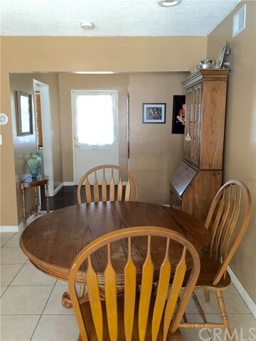 View of front door and entry hall.