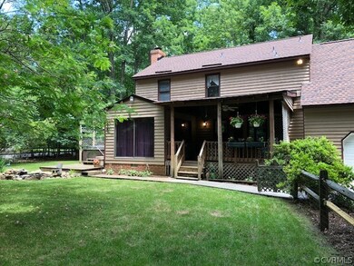 Covered 16x12 porch with a ceiling fan overlooking