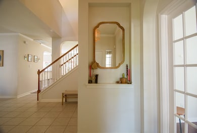 Welcome to an inviting entryway with elegant tile