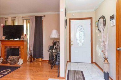 Entrance foyer featuring light hardwood / wood-sty
