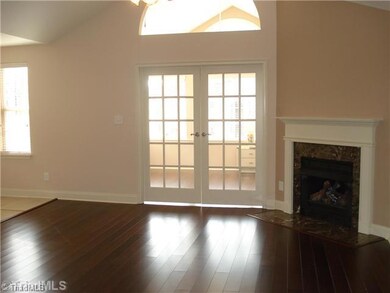 Sunroom. Like new Milhaven Landing home with cathedral ceilings, marble fireplace, gleaming hardwood floors, a southern exposure sun filled kitchen and handicap accessible rooms.