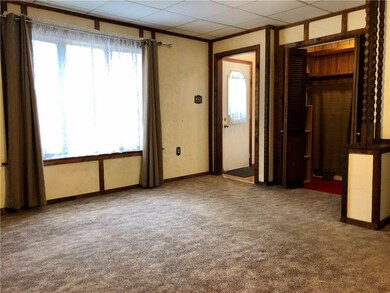 Near the entry is a large coat closet with shelvin