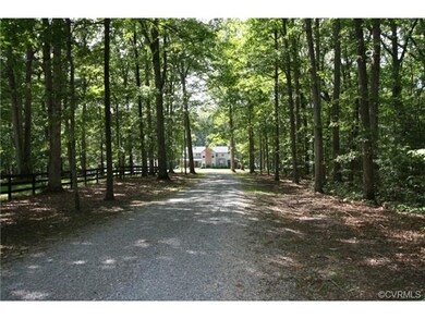 Long private driveway conceals home from the road.
