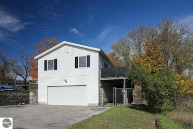 8335 S Maple City Rd, Maple City, MI 49664 - photo 5