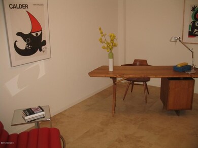 Den with cabinets