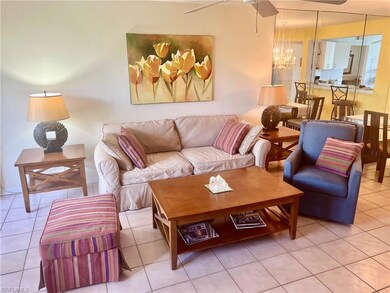 Living room featuring an inviting chandelier and t