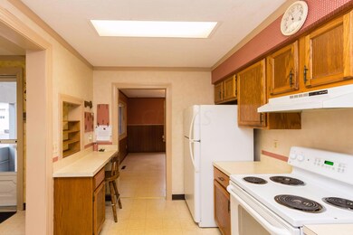 Functional Kitchen w/ White Appliances.