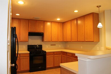 This kitchen has plenty of storage space 29 cabinets and 9 drawers. It also features recessed lighting and 42