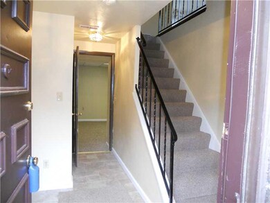 Entry/Foyer. The foyer boasts new flooring and is 