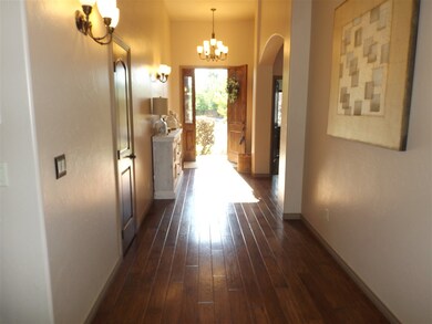 Foyer is a WOW factor with cathedral ceilings, han