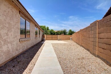 side yard with RV gate and slab