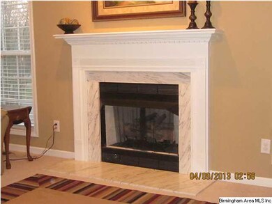 MARBLE FIREPLACE WITH GAS LOGS