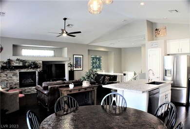 DINING AREA ACCENTED WITH BALCONY ACCESS FEATURING