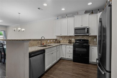 Kitchen right off the foyer on the main floor.