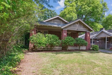 View of front of property with a front yard