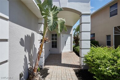 Entrance to property featuring stucco siding