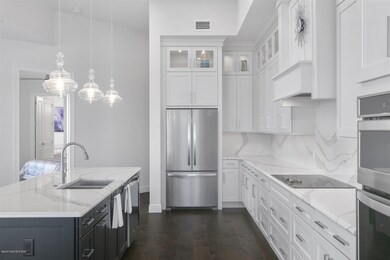 White quartz counters and backsplash