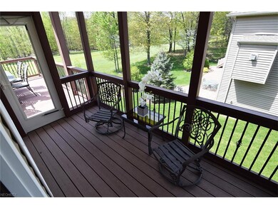 Side screened-in porch off eat-in area of kitchen