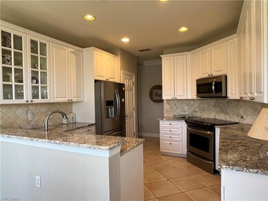 Remodeled kitchen with new countertops and custom 