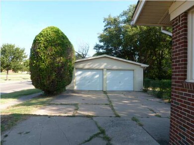 Extra large two car detached garage with 3rd door 