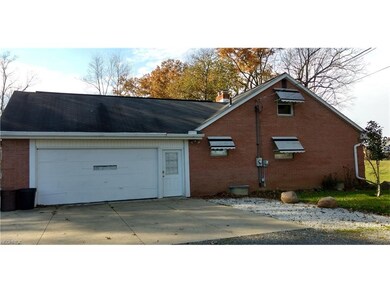 Two car attached garage with 2 man doors. The seco