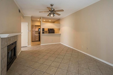 Living and dining area with extensive ceramic tile