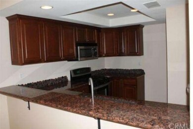 Kitchen bar which opens to famliy room.