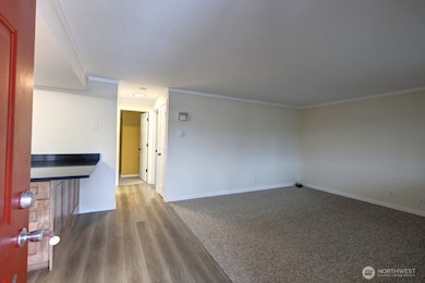 Welcome home. Complete remodel including flooring, blinds, paint, kitchen cabinets, appliances, counter tops and some lighting