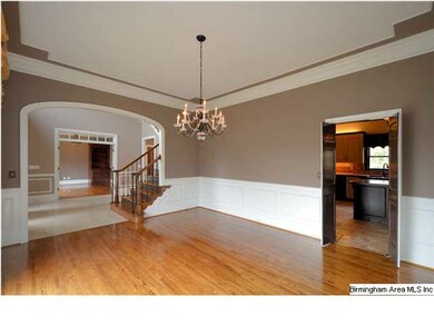 Formal dining room has easy access to kitchen.
