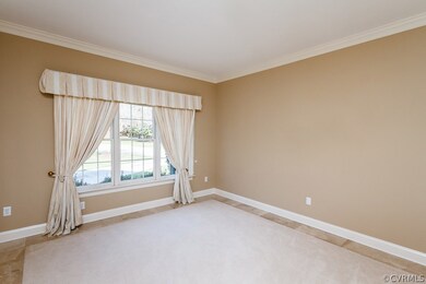 Formal Living Room with carpet and marble border.