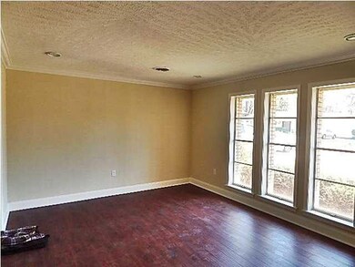 open den and kitchen area