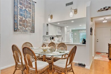 Dining Room looking into Kitchen and entry