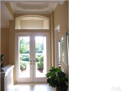 The architectural accents, soaring ceilings, and art niches are found throughout the home.