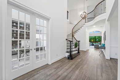 Upon entering the home you will find the first floor office with it's beautiful french doors.