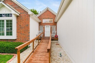 ADA certified ramp built over existing porch. Easy to convert back.