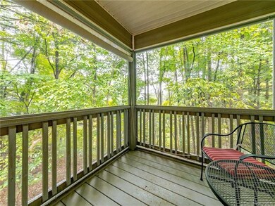 Peaceful and private screened in balcony off of main level living area.
