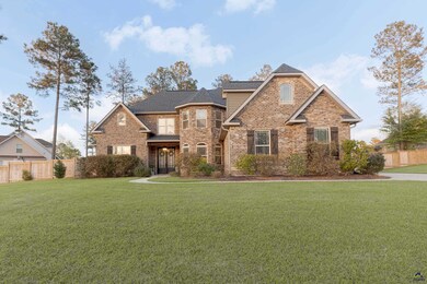 Charming curb appeal welcomes you to this lovely h