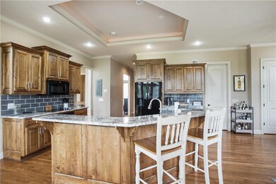 1556 Brompton Ln, Raymore, MO 64083 - photo 6