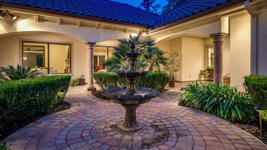 A beautiful centerpiece, this tiered fountain adds just the right touch to an inviting courtyard with covered patio, audio and private access to the Casita