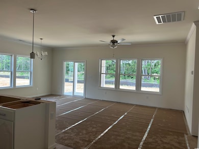 Unfurnished dining area with ornamental molding, a ceiling fan, and a chandelier