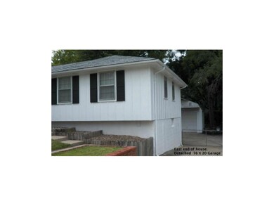 East side of house, concrete basement
