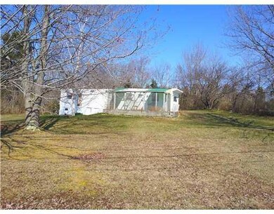 Exterior Front. Mobile home is...