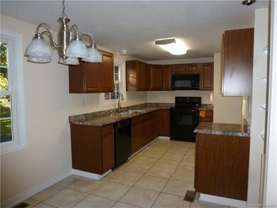 Larger than picture appears..this eat in kitchen i