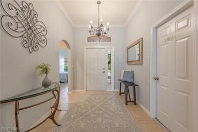 Tiled entrance foyer. Arch to left leads to 2 bedr