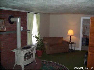 Living Room. Gas stove for cozy evenings.