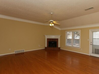 Nice, larger Great Room with fireplace and gleamin
