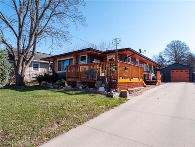 Front of home with view of driveway and Garage