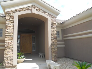 Covered Entry to Oversized Front Door