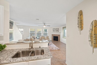 The kitchen overlooks a spacious family room.