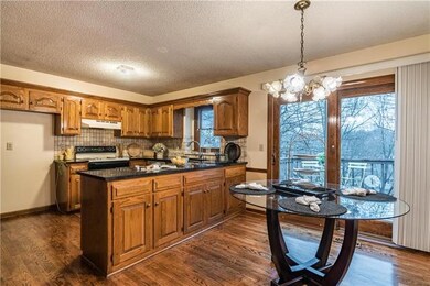 Eat in kitchen with new granite.